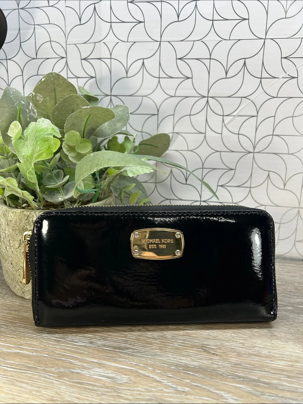 2828 Michael Kors Black Patent Leather Zip Wallet with Gold Plaque